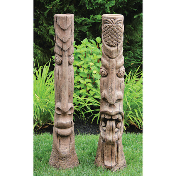 exotic tiki set of posts with one sculpture with its tongue Lounge statues